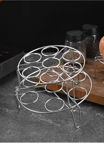 Detailed view of the double-layer stainless steel egg steaming rack in a kitchen setting