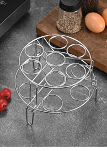 Detailed view of the 304 stainless steel double-layer egg steaming rack in a kitchen