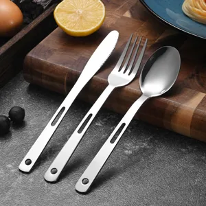 High-quality stainless steel cutlery set with unique hollow handle design for camping.