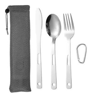 Portable 3-piece stainless steel camping cutlery set with gray mesh storage bag and carabiner