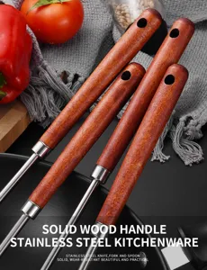 Detailed view of the premium solid wood handles on stainless steel kitchen utensils