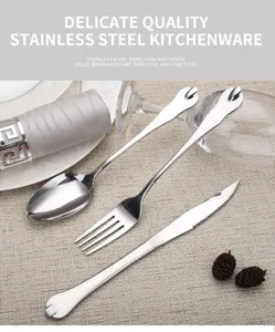 Close-up detail of stainless steel cutlery set with unique waterdrop handle design