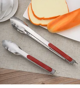Detailed view of non-magnetic stainless steel food tongs with non-slip red handles