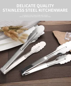 Set of four different sized stainless steel kitchen tongs with scalloped edges