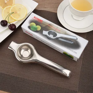 Manual stainless steel lemon squeezer press with packaging box and lemon slices