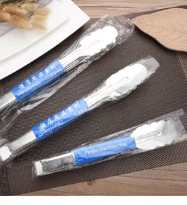Polished stainless steel food tongs with individual plastic wrap for restaurant use.