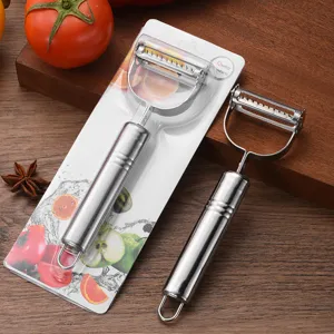 Professional stainless steel julienne vegetable peeler set on a dark wooden table