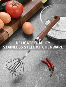 Detail view of a semi-automatic stainless steel whisk featuring a wood grain handle