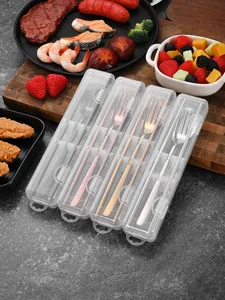 Detail shot of portable cutlery sets with spoons and forks in transparent cases.