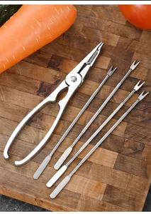 Professional stainless steel crab cracker and needle fork set for fine seafood dining