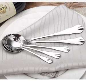 Elegant mirror finish stainless steel round spoons with unique notched handle design