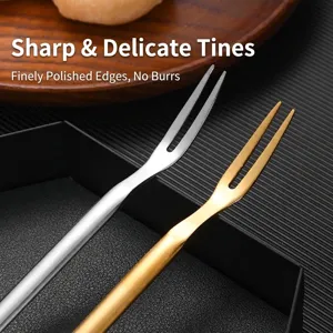 Elegant stainless steel two-prong fruit and dessert forks in gold and silver finish