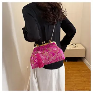 Elegante pinkfarbene Abendtasche mit Stickerei, Bambusgriff und langem Quastendetail
