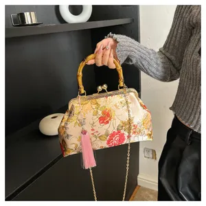 Sac à main brodé de fleurs de style chinois avec poignée en bambou et gland rose