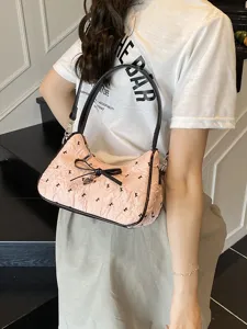 Chic pink hobo underarm bag with black bow and letter print pattern