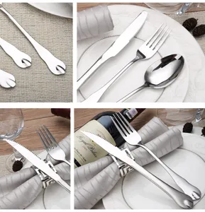 Detailed view of polished stainless steel cutlery set featuring cute cat paw handle design