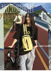 Yellow nylon outdoor chest bag shown in a professional cycling lifestyle scene