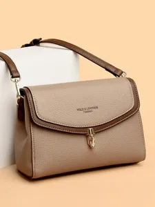 Elegant litchi pattern color-block crossbody bag with vintage gold lock buckle closure