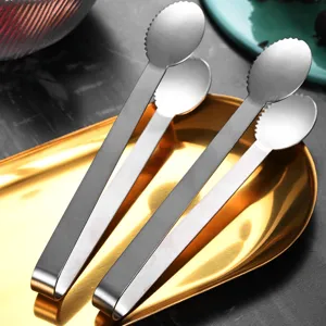 Brushed 304 stainless steel ice tongs with serrated teeth on a luxury golden tray