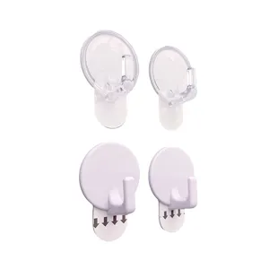 Ganci da parete adesivi senza foratura dettaglio, design trasparenti e bianchi per casa.