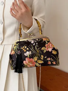 Sac de soirée vintage à fleurs avec poignée en bambou et accessoire pompon noir