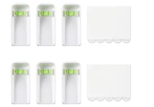 Kit per appendere quadri con livella a bolla integrata e forti strisce adesive.