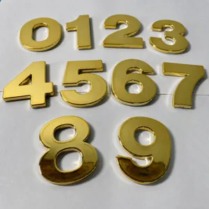 Gold ABS plastic plated house numbers, 0 to 9 door digits for hotel room identification use.