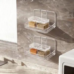 Detail view of two-tier transparent wall-mounted storage shelves with containers