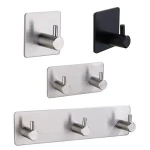 Ganci da parete adesivi in acciaio inossidabile senza foratura, set pratico per casa.
