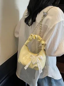 Sac à main jaune plissé tendance avec nœud et accessoire perle