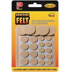 Macro detail view of various sized beige adhesive felt pads for floor and furniture protection