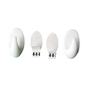 Crochets muraux blancs amovibles avec bandes adhésives et flèches pour une pose sans traces.