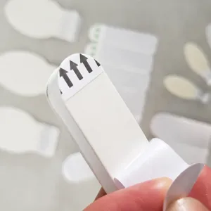 Trace-free double-sided adhesive tape for hanging hooks, removable and safe for walls.