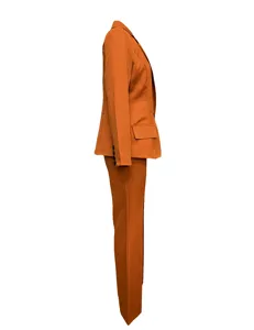 Side detail of women orange suit blazer and trousers, slim fit professional wear style.