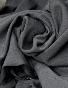 Black plus size women dress fabric detail showcasing soft texture and delicate zipper trim.