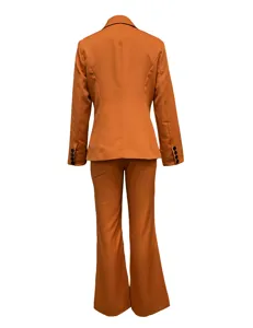 Women's casual orange pantsuit back view detail, slim fit blazer and flared trousers.