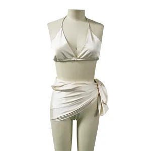 Set bikini in raso monocolore con gonna a portafoglio costume da bagno spiaggia donna.