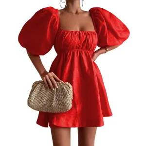 Detailed view of red square neck puff sleeve mini dress showcasing elegant style and fit.