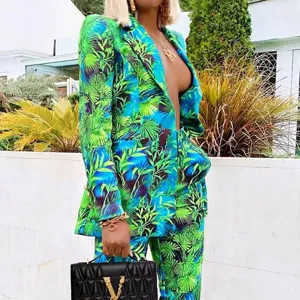 Stylish tropical print blazer and pants set for women, perfect for casual fashion and chic looks.