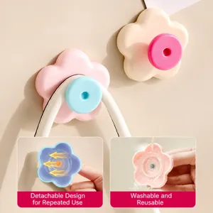 Flower suction cup hook home punch-free removable reusable wall hook for door key storage.