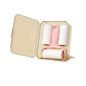 Portable mini lint roller set with case and refill rolls for clothes cleaning and fur removal.