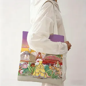 Modelo lleva un bolso de lona con una ilustración de arquitectura de la ciudad de París.