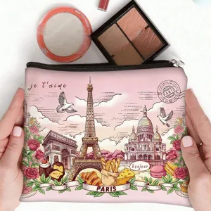 Close-up of a vintage Paris-themed makeup bag with Eiffel Tower illustration.
