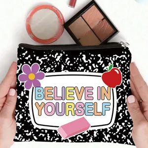 Detailed view of canvas pouch with 'Believe in Yourself' motivational print