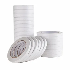 White double-sided tape rolls, high viscosity hot melt adhesive tape for office and student use.