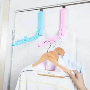 Over the door folding clothes drying rack with 5 holes, portable travel laundry organizer.