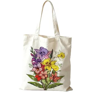 Detalle de estampado floral vintage en bolso tote de lona blanca de gran capacidad