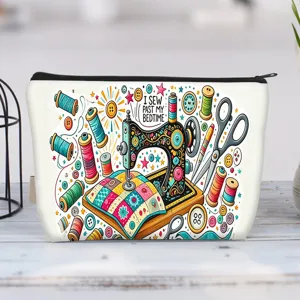 Detailed view of white canvas pouch featuring colorful sewing machine and thread patterns