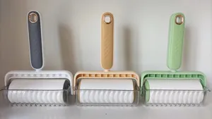 Lint roller detail view, modern minimalist design for clothes and pet hair removal, clean look.