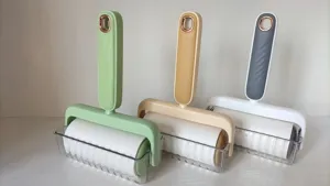 Portable lint roller set for clothes and pet hair removal with transparent storage base.